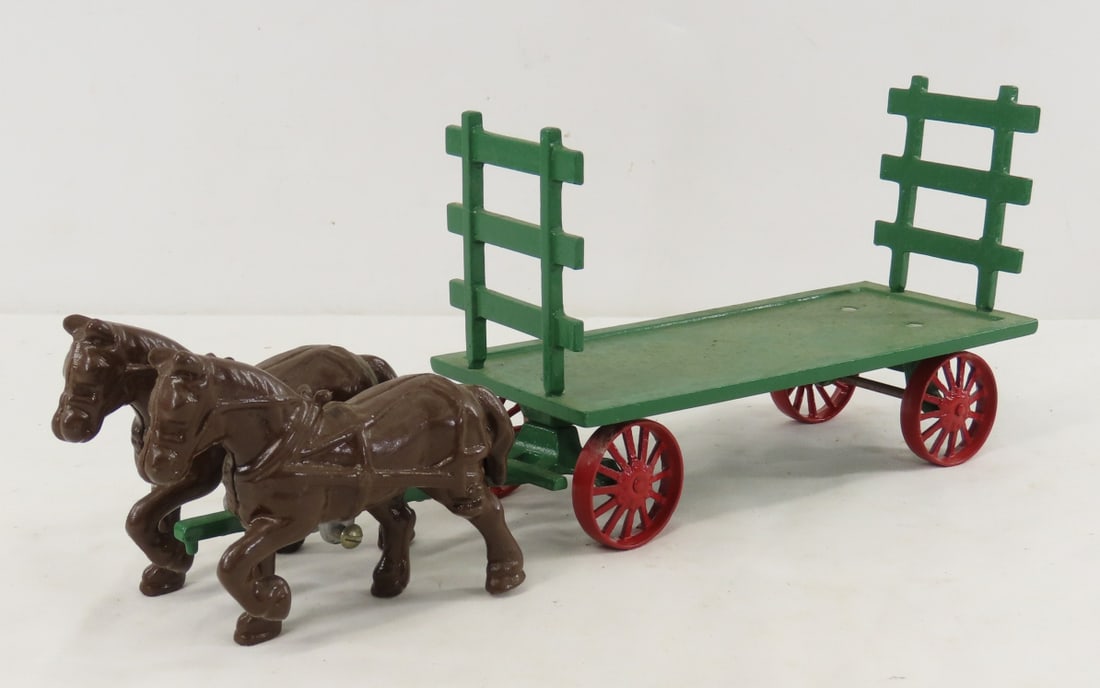 Irvin's Model Shop Cast Iron Horse Drawn Hay Wagon: Irvin's Model Shop Cast Iron Horse Drawn Hay Wagon - LOT SIZE: 13x4x6" 2 LBS All information and photos, which are part of the description, are intended to be as accurate as possible, but errors are