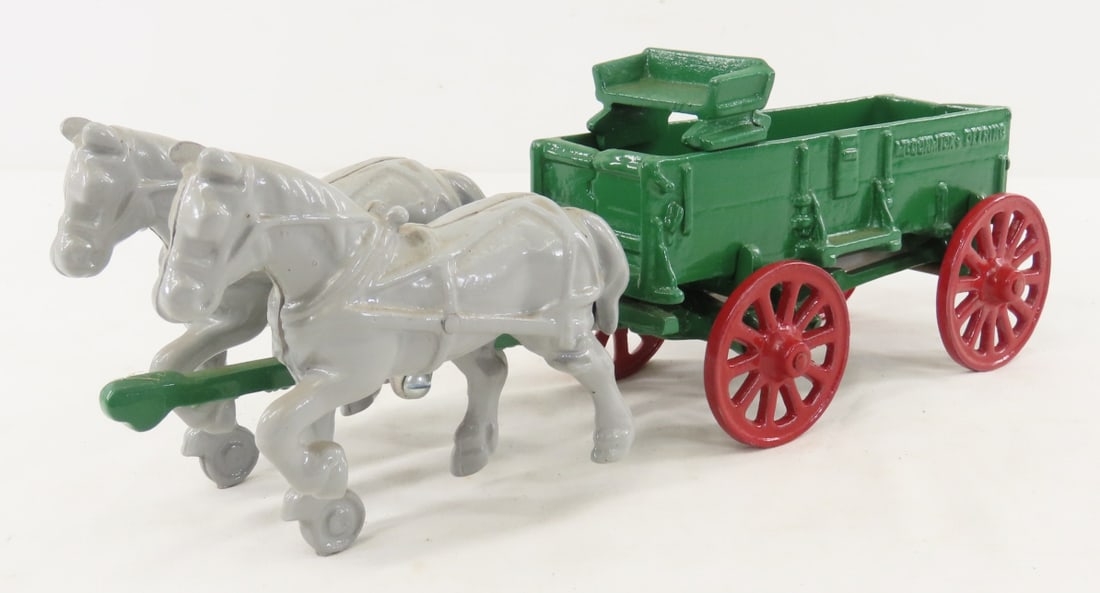 Irvin's Model Shop Arcade MD Horse Drawn Wagon: Irvin's Model Shop Arcade MD Horse Drawn Wagon - McCormick-Deering, back of seat is marked Arcade, tongue is marked Irvin's Model Shop, all repainted. LOT SIZE: 12x4x4" 2 LBS All information and photo