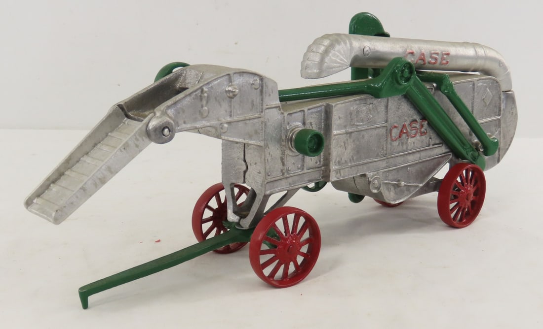 Irvin's Model Shop Case Thresher: Irvin's Model Shop Case Thresher - cast metal, approx 1/24, LOT SIZE: 14x4x6" 2 LBS All information and photos, which are part of the description, are intended to be as accurate as possible, but