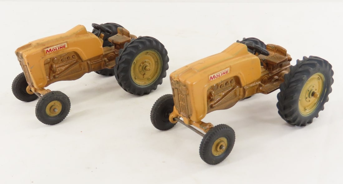 2 Minneapolis-Moline 445 Power Lined Tractors: 2 Minneapolis-Moline 445 Power Lined Tractors - approx 1/24 scale diecast, copper color belly & seat , LOT SIZE: 6x7x3" 1 LB All information and photos, which are part of the description, are