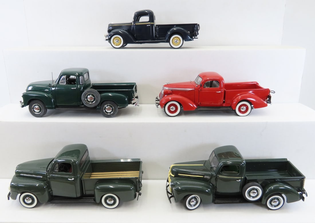 5 Danbury Mint Diecast Trucks: Studebaker, Chevy: 5 Danbury Mint Diecast Trucks: Studebaker, Chevy - All 1/24. 1953 Chevrolet Pickup, 1933 Ford Pickup(broken rear bumper), 1937 Studebaker, 1951 Ford F1 Pickup, 1942 Ford Pickup. LOT SIZE: 10x9x8" 8 LB