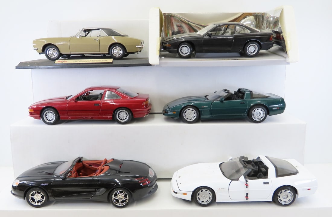 6 Maisto 1/18 Diecast Cars: BMW, Camaro, Corvette: 6 Maisto 1/18 Diecast Cars: BMW, Camaro, Corvette - (2)1990 BMW 850i, 1967 Chevrolet Camaro Z/28, Mustang Mach III, (2)1992 Corvette ZR-1. LOT SIZE: 18x14x8" 10 LBS All information and photos, which a