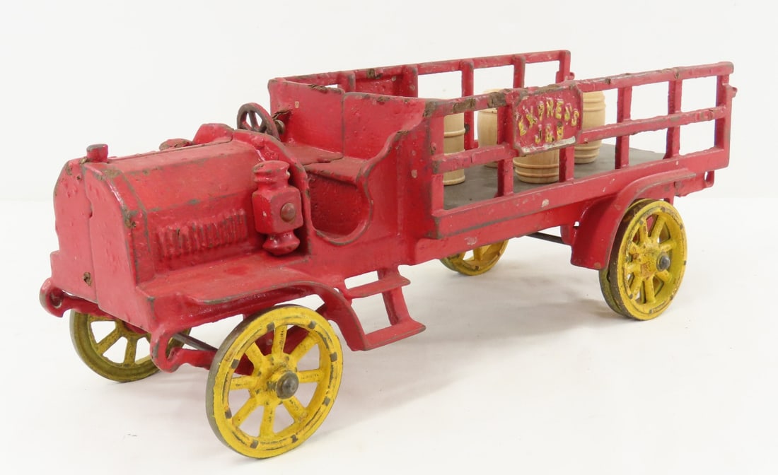 Vintage Cast Iron Jones & Bixler Stake Truck: Vintage Cast Iron Jones & Bixler Stake Truck - Missing Original Barrels and Driver. LOT SIZE: 15x6x5" 8 LBS All information and photos, which are part of the description, are intended to be as accurat