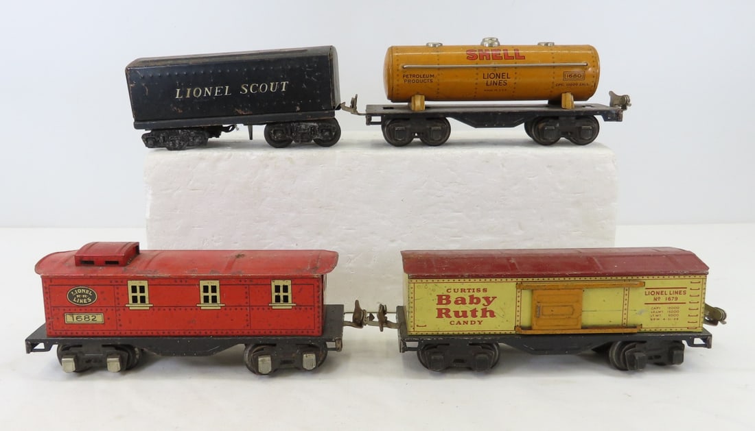4 Lionel Tin Litho O Gauge Train Cars: 4 Lionel Tin Litho O Gauge Train Cars - LOT SIZE: 10x9x4" 3 LBS All information and photos, which are part of the description, are intended to be as accurate as possible, but errors are possible. No