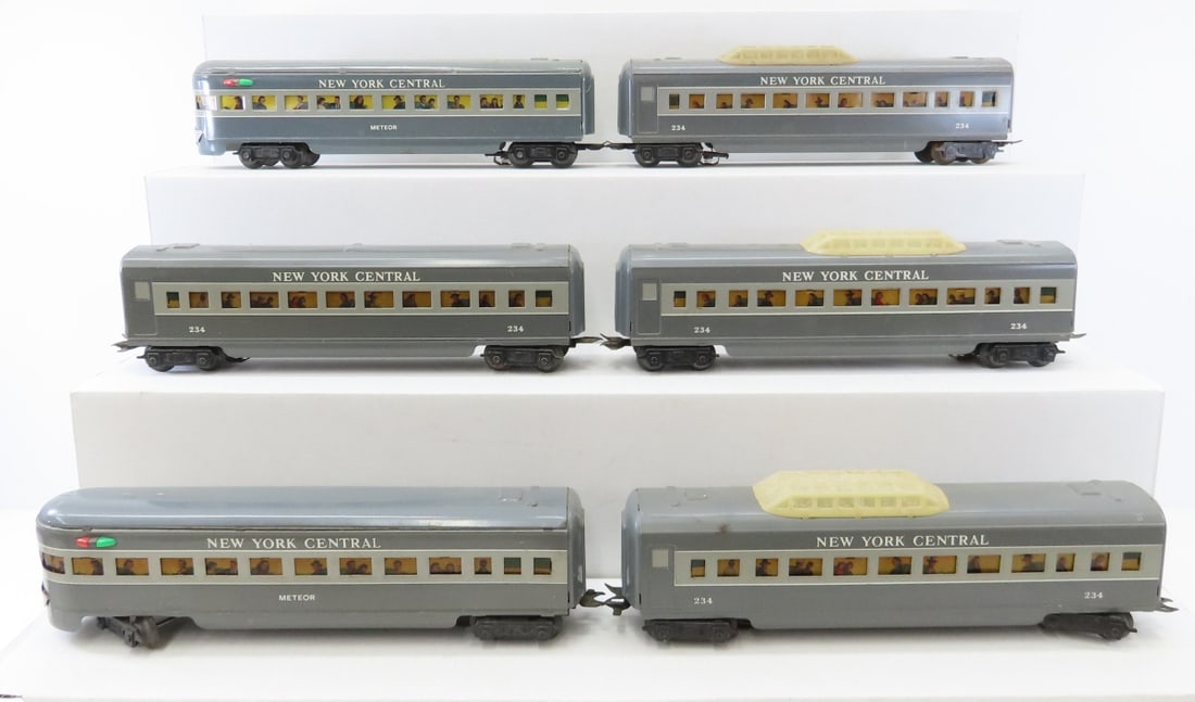 Marx NYC Meteor O Gauge Passenger Train Set: Marx NYC Meteor O Gauge Passenger Train Set - 2 Meteor cars, (4) 234 cars- 3 are dome cars. LOT SIZE: 11x15x4" 5 LBS All information and photos, which are part of the description, are intended to be