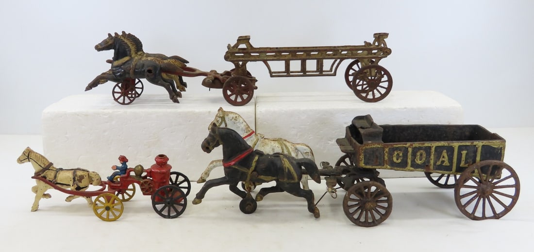 Hubley Cast Iron Horse Drawn Coal & Fire Wagons: Hubley Cast Iron Horse Drawn Coal & Fire Wagons - Hubley Coal wagon with 2 horses - no driver, fire ladder wagon with 3 horses (incomplete), and pieced together single horse water wagon. LOT SIZE: