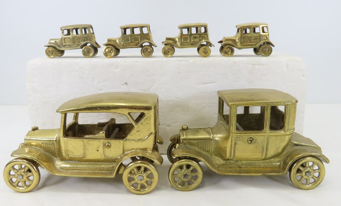 6 Brass Car Models: 2 6" marked Canada: 6 Brass Car Models: 2 6" marked Canada - and 4 2.5", LOT SIZE: 9x7x4" 5 LBS All information and photos, which are part of the description, are intended to be as accurate as possible, but errors are