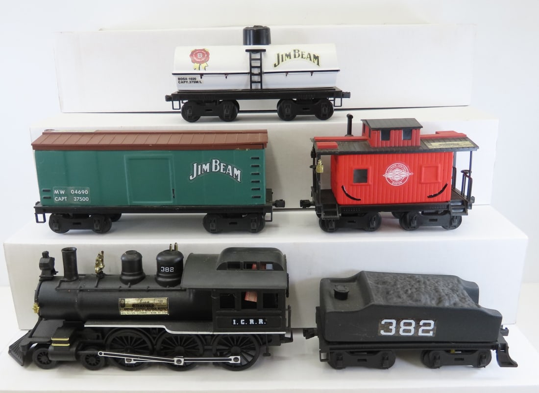 Jim Beam Whiskey Decanter 1991 ICRR Train Set: Jim Beam Whiskey Decanter 1991 ICRR Train Set - only 1 is full (must be emptied for shipping), Engine, tender and 3 cars. Engine is 12" LOT SIZE: 17x13x5" 9 LBS All information and photos, which are