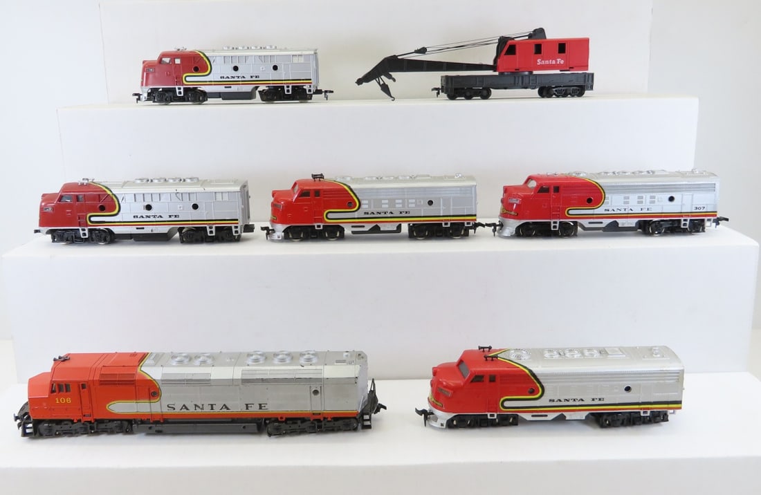6 Santa Fe HO Scale Diesels & 1 Crane Car: 6 Santa Fe HO Scale Diesels & 1 Crane Car - Lima Italy Santa Fe 106 w/power, 2 Model Power Santa Fe engines w/power, Bachmann Santa Fe 307 w/ power, 2 Santa Fe engines w/ power made in Macao, 1