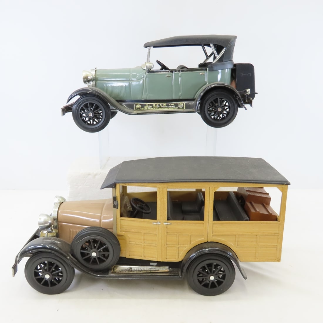 2 Jim Beam Whiskey 1929 Ford Car Decanters: 2 Jim Beam Whiskey 1929 Ford Car Decanters - 1929 Ford Model A & Woody full- still sealed (we have to empty for shipping), LOT SIZE: 17x14x7" 13 LBS All information and photos, which are part of the