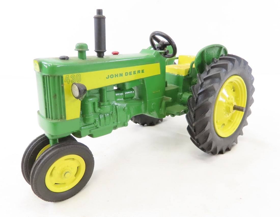 Unsigned Custom John Deere 430 NF Tractor: Unsigned Custom John Deere 430 NF Tractor - 3 point hitch, 1/16 diecast, LOT SIZE: 9x5x6" 2 LBS All information and photos, which are part of the description, are intended to be as accurate as