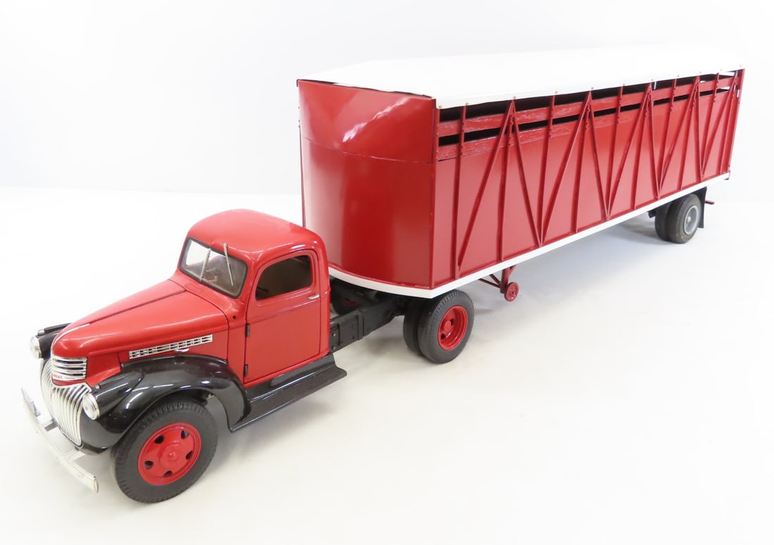 Custom 1941 Chevrolet Truck & Livestock Trailer: Custom 1941 Chevrolet Truck & Livestock Trailer - pressed metal and wood trailer is 21", looks like partial custom truck - there is a 1412 stamped on underside of cab base, approx 1/24 scale. LOT