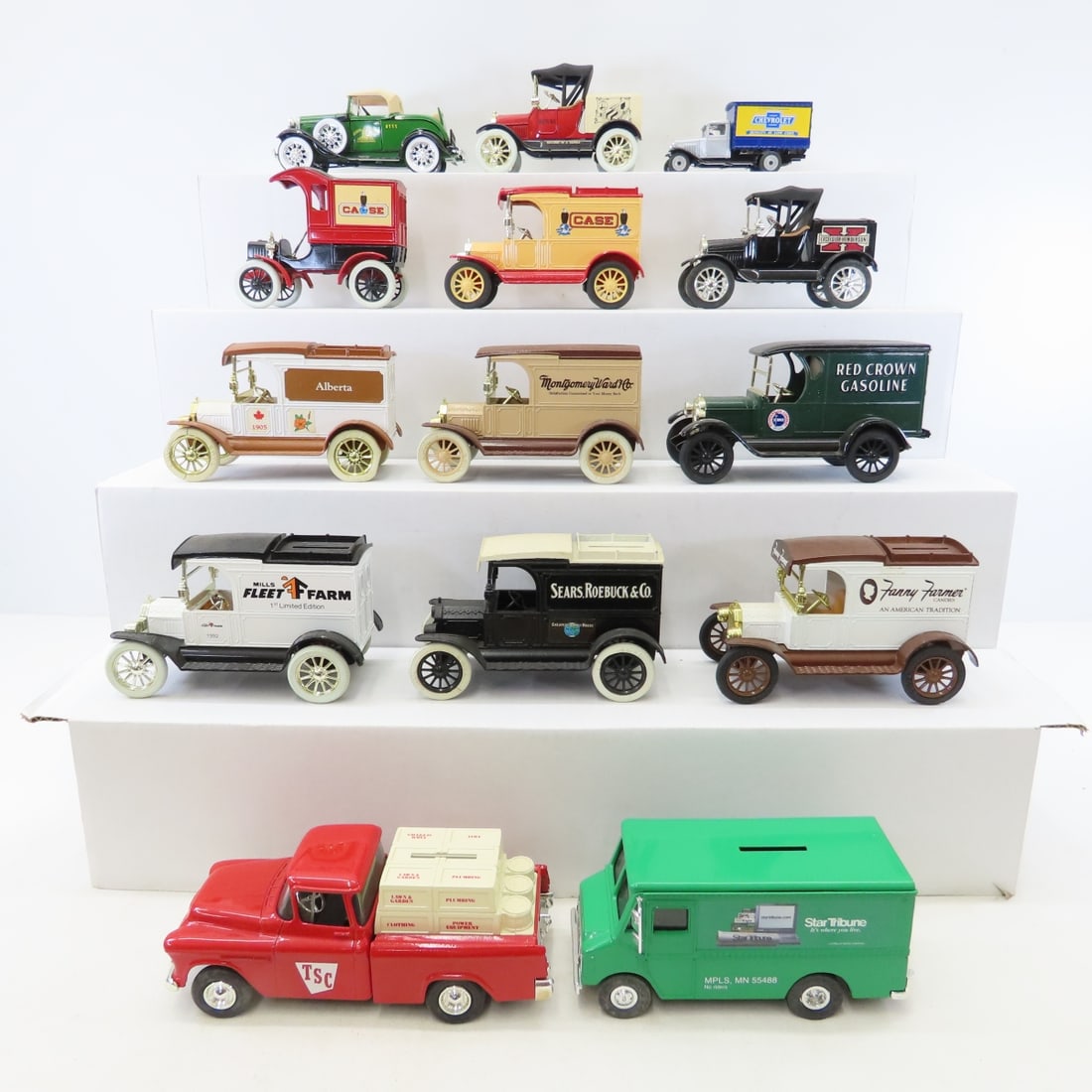 14 ERTL Car & Truck Diecast Coin Banks: 14 ERTL Car & Truck Diecast Coin Banks - some do not have keys. LOT SIZE: 19x15x4" 15 LBS All information and photos, which are part of the description, are intended to be as accurate as possible,