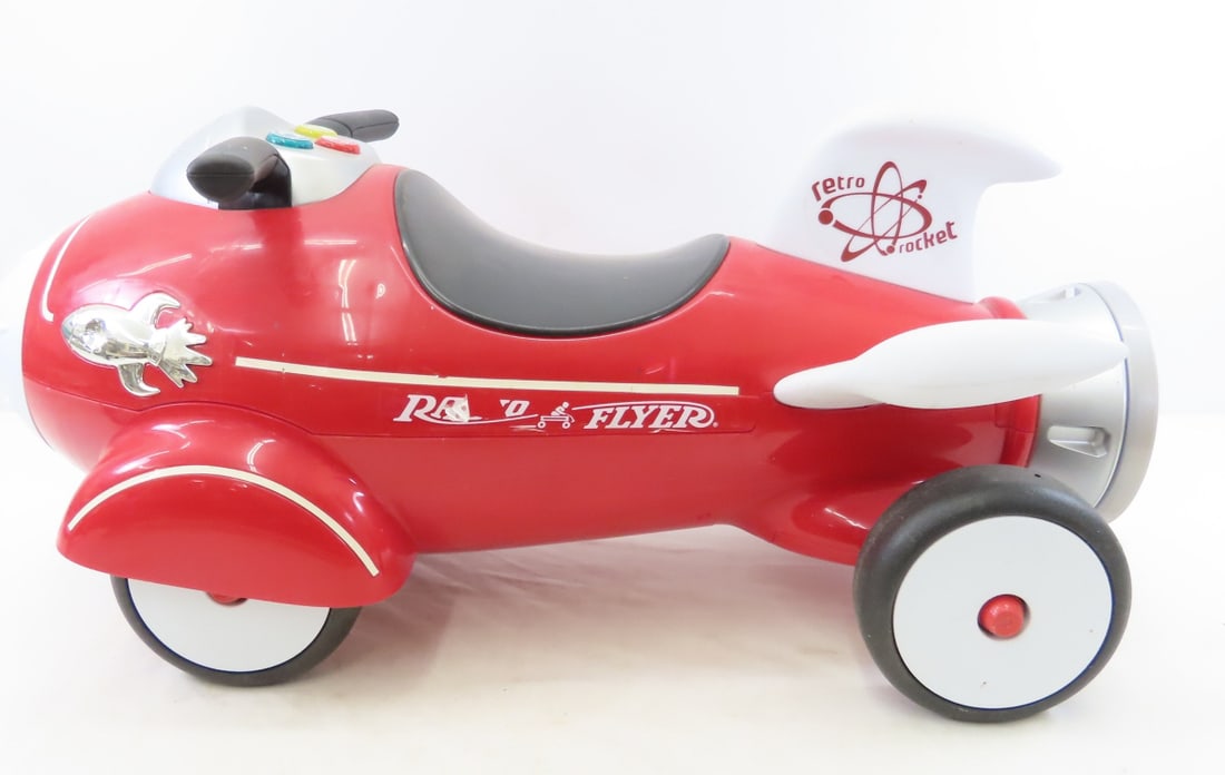 Radio Flyer Ride-On Retro Rocket: Radio Flyer Ride-On Retro Rocket - batteries had corroded in compartment- sound/light does not work now. Can still use as ride-on. All plastic. LOT SIZE: 26x13x13" 7 LBS All information and photos,