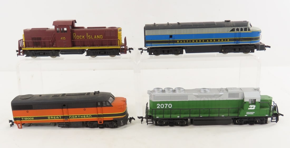 4 HO Scale Diesel Engines: Lionel, AHM, Bachmann: 4 HO Scale Diesel Engines: Lionel, AHM, Bachmann - AHM B&O, Lionel GN, Bachmann BN, and unmarked RI. LOT SIZE: 8x10x3" 3 LBS All information and photos, which are part of the description, are