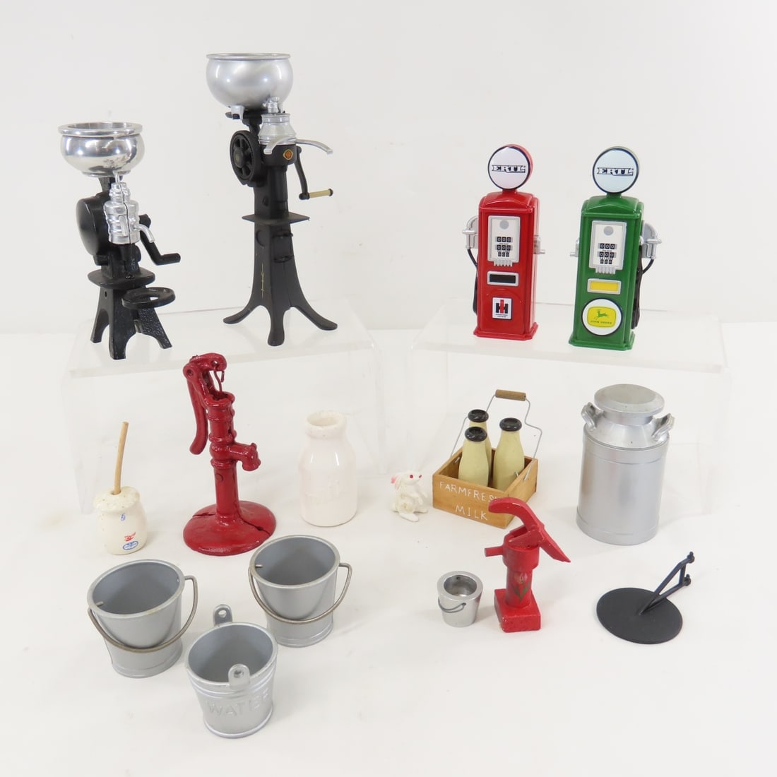ERTL Miniature Cream Separators, Gas Pumps & More: ERTL Miniature Cream Separators, Gas Pumps & More - 3 marked ERTL, metal, ceramic, wood & plastic. LOT SIZE: 15x8x3" 3 LBS All information and photos, which are part of the description, are intended