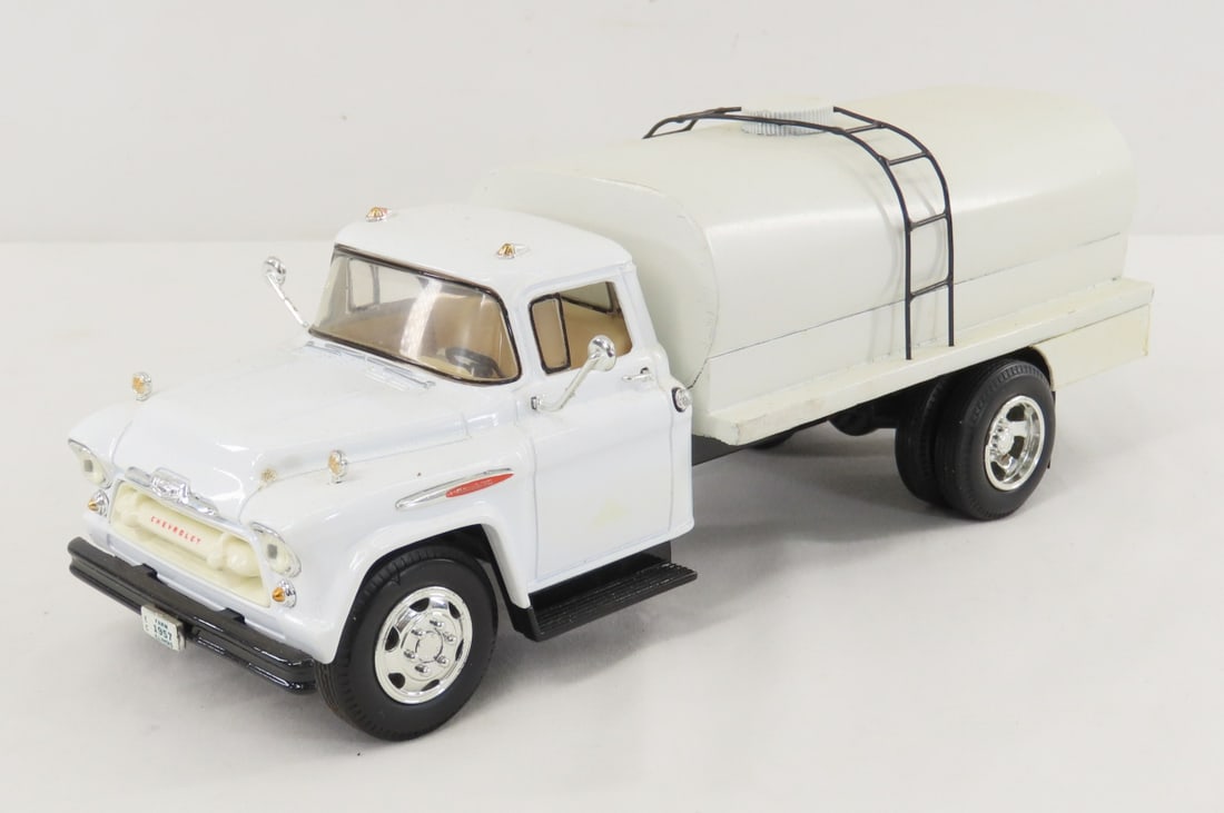 ERTL 1957 Chevrolet Truck with Custom Tanker: ERTL 1957 Chevrolet Truck with Custom Tanker - LOT SIZE: 10x5x4" 2 LBS All information and photos, which are part of the description, are intended to be as accurate as possible, but errors are