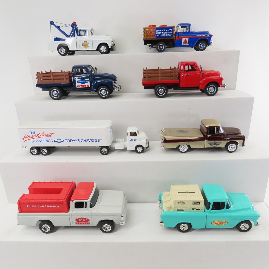 5 Truck Coin Banks & 3 1/24 Diecast Stake Trucks: 5 Truck Coin Banks & 3 1/24 Diecast Stake Trucks - 3 Made in China 1/24 diecast stake trucks, ERTL GM True Value Bank, ERTL 1960 Ford Bank (no key) , SpecCast tow truck bank, ERTL Chev semi truck bank