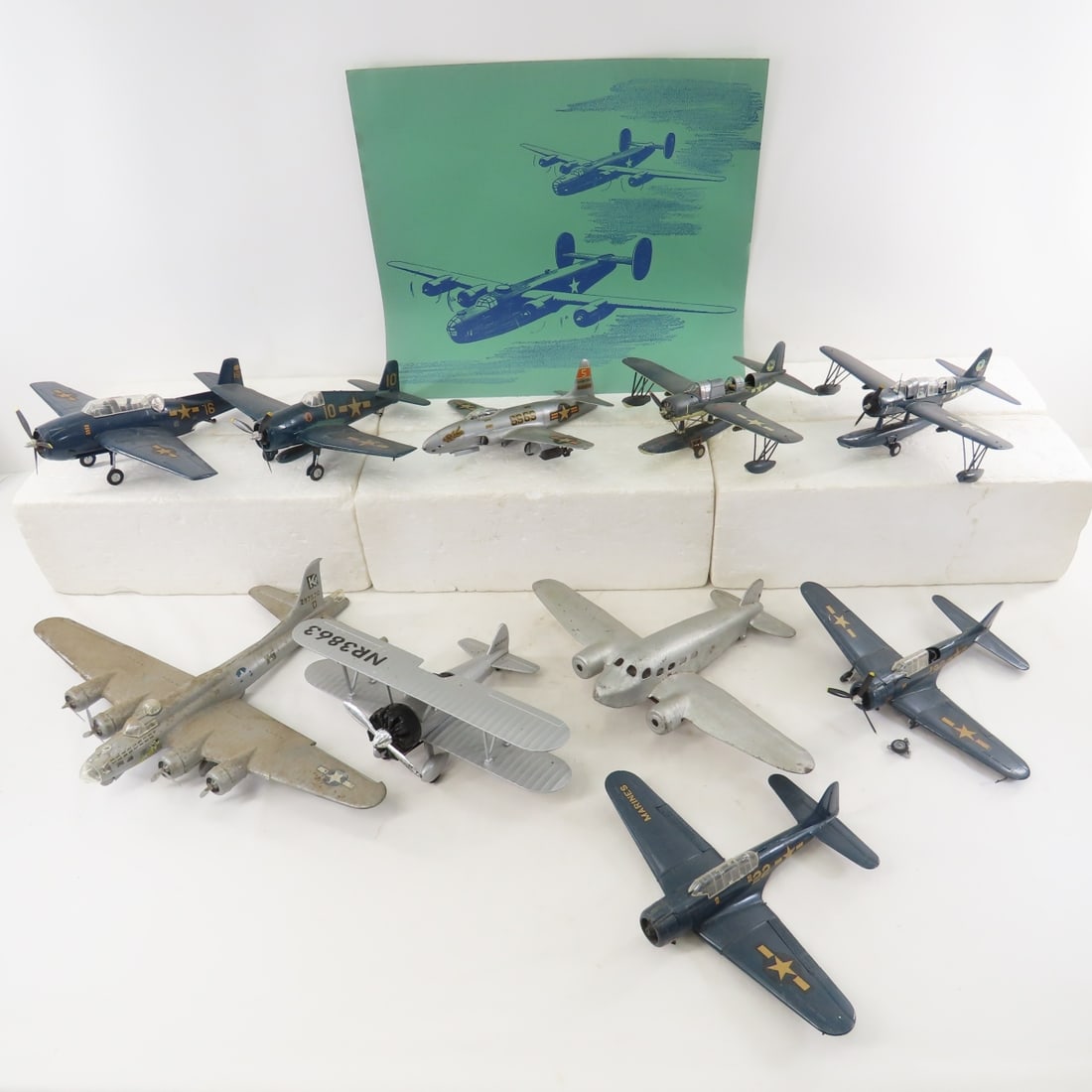 2 Metal & 8 Plastic Airplane Models & 6 Art Prints: 2 Metal & 8 Plastic Airplane Models & 6 Art Prints - 6 art print of Vultee Aircraft Airplanes in folio 16x14", 1 metal Liberty Classics bi-plane, other is a repainted vintage plane, some plastic