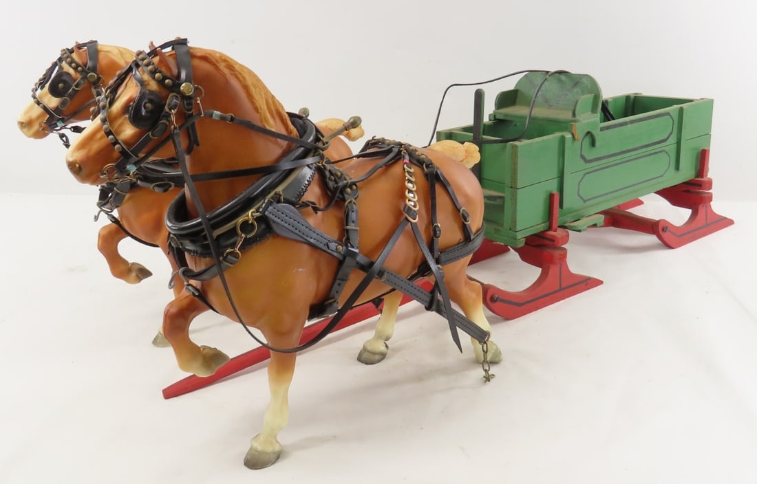 2 Breyer Horse Team Pulling Custom Wood Sled Wagon: 2 Breyer Horse Team Pulling Custom Wood Sled Wagon - plastic horses with leather harnesses, wagon is unsigned - 1 leg of seat is broken off- still stays in place. LOT SIZE: 14x12x11" 4 LBS All