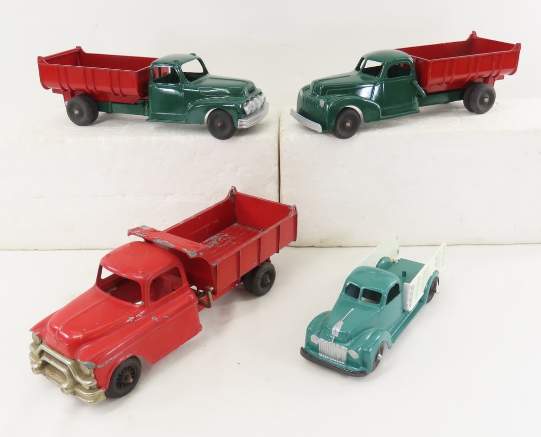 4 Hubley Kiddie Toy Trucks: 4 Hubley Kiddie Toy Trucks - (1) 7" and (3) 9", LOT SIZE: 13x10x4" 4 LBS All information and photos, which are part of the description, are intended to be as accurate as possible, but errors are possi