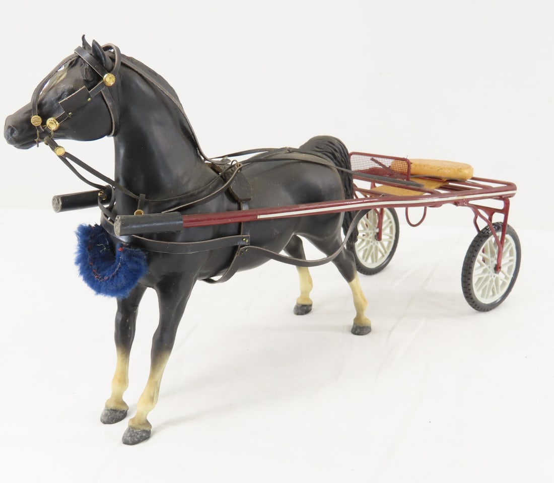 Custom Racing Sulky with Plastic Breyer Horse: Custom Racing Sulky with Plastic Breyer Horse - one wheel is held with pin, metal frame, Breyer plastic horse. LOT SIZE: 15x10x6" 1 LB All information and photos, which are part of the description,
