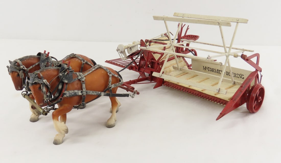 Harold Wolf Custom M-D Horse Drawn Hay Binder: Harold Wolf Custom M-D Horse Drawn Hay Binder - wood & pressed metal binder, approx 1/16 scale. 2 plastic BMC horses with leather harnesses - are spotted - need cleaning. LOT SIZE: 13x14x7" 2 LBS All 