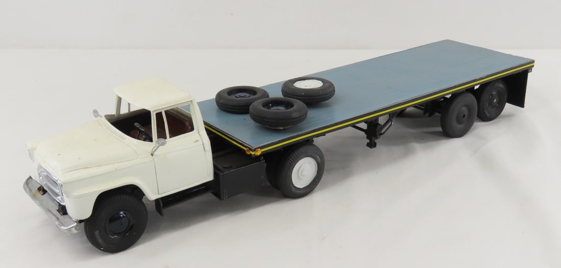 Custom Wood Truck & Flat Bed: Custom Wood Truck & Flat Bed - very fragile, doors do not open, unmarked,, approx 1/24 scale. LOT SIZE: 19x4x4" 2 LB All information and photos, which are part of the description, are intended to be a