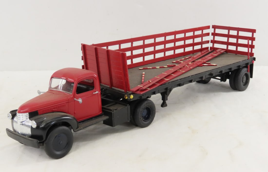 Custom Wood and Plastic Stake Truck: Custom Wood and Plastic Stake Truck - 1 side has come unglued- 1 small stake missing. very fragile, cab is plastic. approx 1/24 LOT SIZE: 18x6x5" 1 LB All information and photos, which are part of