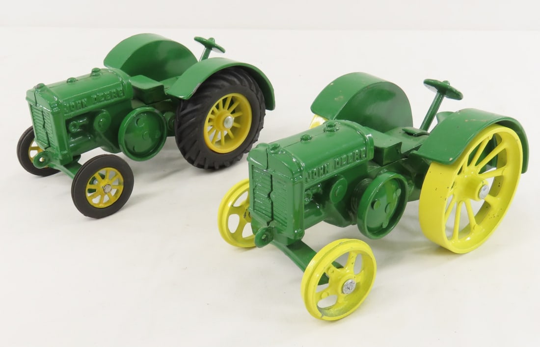 2 Unbranded John Deere Model D Tractors: 2 Unbranded John Deere Model D Tractors - 1 with steel wheels and other with plastic, 1/16 diecast, LOT SIZE: 6x8x4" 3 LBS All information and photos, which are part of the description, are intended t