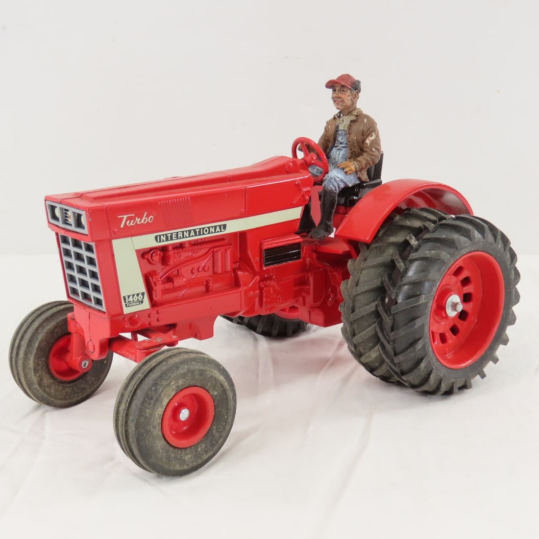 ERTL International Farmall 1466 Turbo Tractor: ERTL International Farmall 1466 Turbo Tractor - with Foxfire Farms driver, 1/16 diecast WF dual tractor, LOT SIZE: 10x6x8" 2 LBS All information and photos, which are part of the description, are