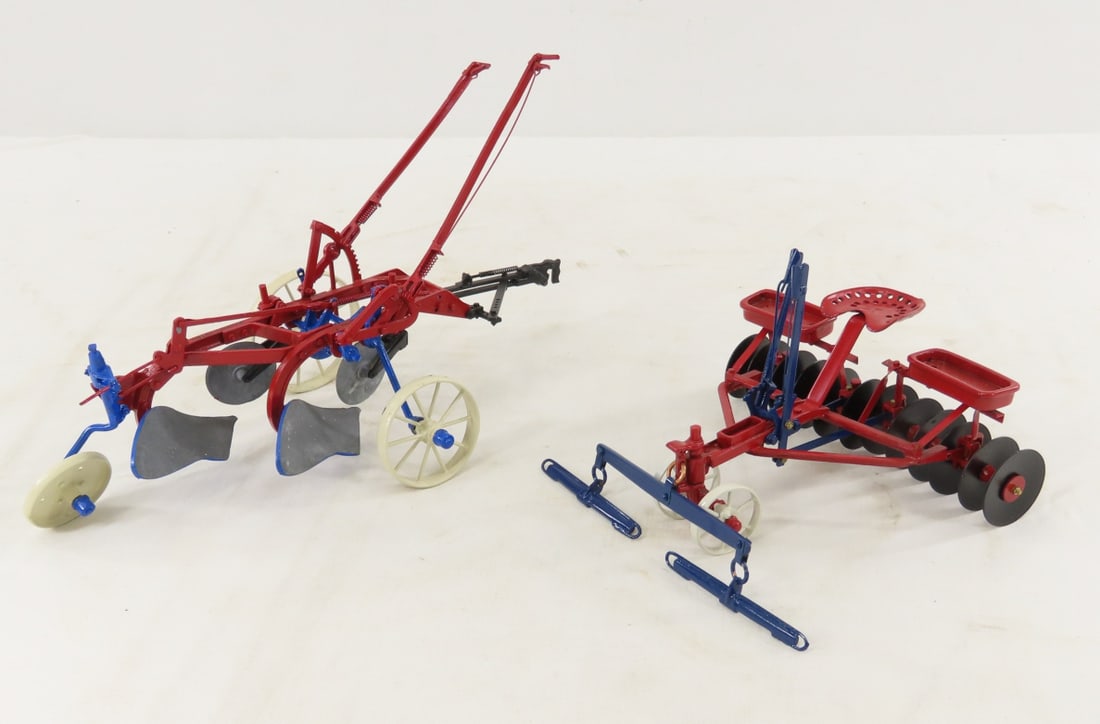 2 Gilson Riecke Custom McCormick-Deering Plows: 2 Gilson Riecke Custom McCormick-Deering Plows - Little Genius 2 bottom plow has Gilson Riecke sticker, other 2 horse drawn seat disc is not marked. LOT SIZE: 8x8x5" 1 LB All information and photos,