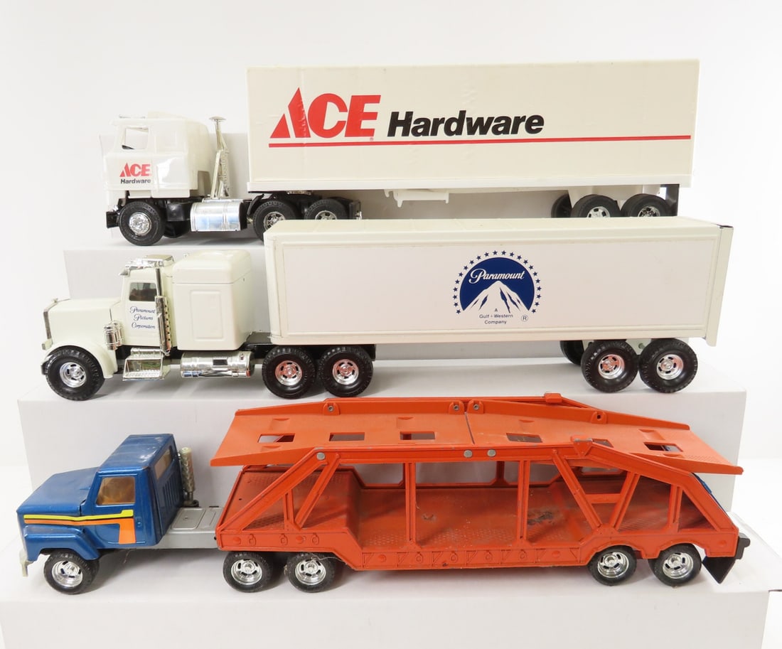 2 ERTL & 1 Processed Plastics Truck & Trailer: 2 ERTL & 1 Processed Plastics Truck & Trailer - ERTL car hauler & pressed steel Paramount truck- both 14" trailers, Processed Plastics ACE Hardware cab and 16" trailer. LOT SIZE: 21x15x7" 9 LBS All