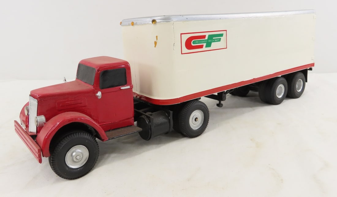 Custom Wood Consolidated Freight Tractor & Trailer: Custom Wood Consolidated Freight Tractor & Trailer - very fragile, doors do not open, unmarked, approx 1/24 scale. LOT SIZE: 17x4x7" 2 LBS All information and photos, which are part of the
