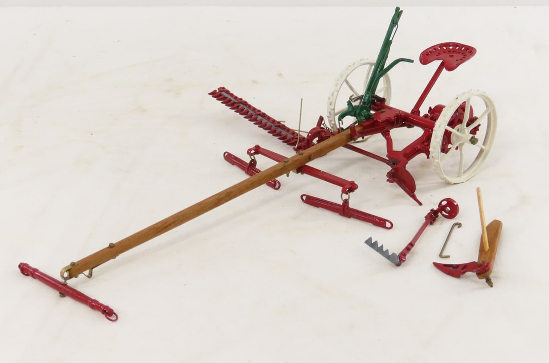 Custom Seated Horse Drawn Sickle Bar Mower: Custom Seated Horse Drawn Sickle Bar Mower - unmarked, 1/16 scale, LOT SIZE: 12x8x4" 1 LB All information and photos, which are part of the description, are intended to be as accurate as possible,