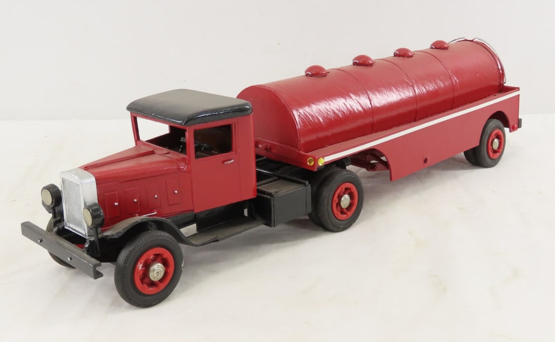 Custom Wood Model Tanker Truck: Custom Wood Model Tanker Truck - very fragile, doors do not open, unmarked, tank looks like cardboard not wood, approx 1/24 scale. LOT SIZE: 17x4x7" 1 LB All information and photos, which are part of 