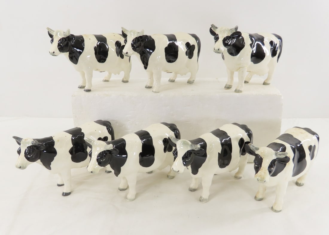 7 Vintage Geo Z Lefton Porcelain Holstein Cows: 7 Vintage Geo Z Lefton Porcelain Holstein Cows - stickers numbered 05395. 1 has broken ear. LOT SIZE: 11x11x6" 3 LBS All information and photos, which are part of the description, are intended to be