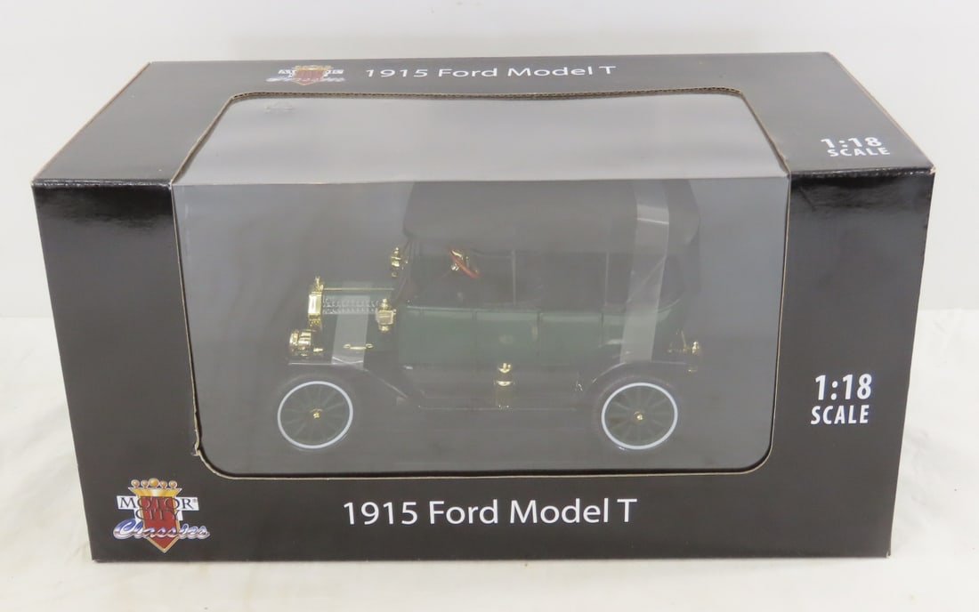 Motor City Classics 1915 Ford Model T 1/18 in Box: Motor City Classics 1915 Ford Model T 1/18 in Box - sealed box, LOT SIZE: 13x8x7" 3 LBS All information and photos, which are part of the description, are intended to be as accurate as possible, but e