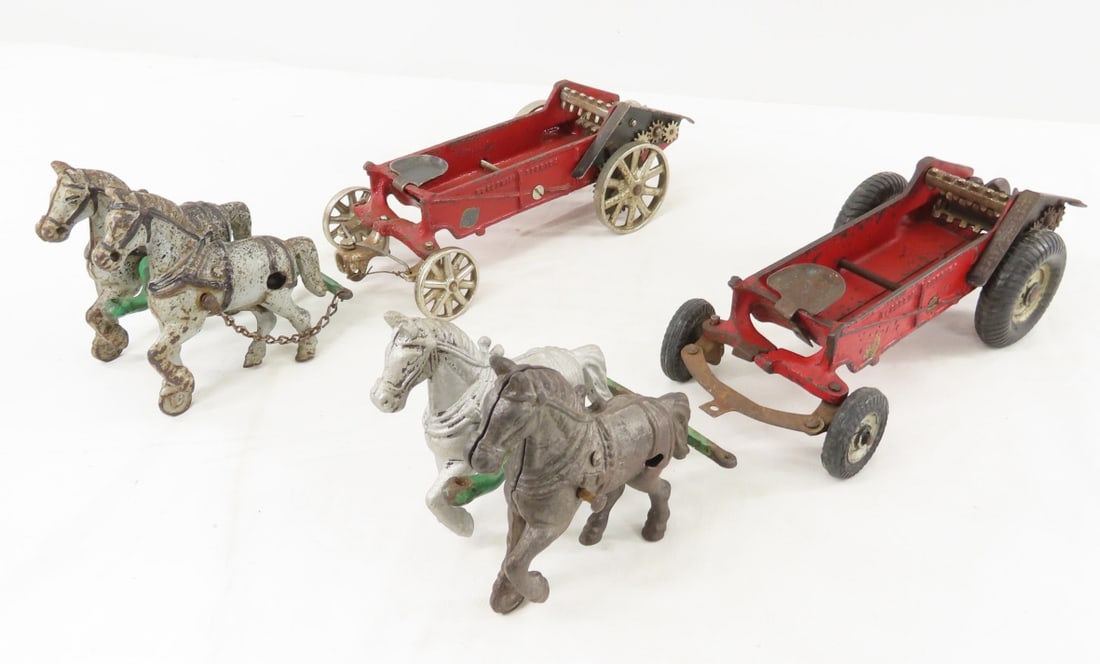2 Arcade MD Horse Drawn Manure Wagons: 2 Arcade MD Horse Drawn Manure Wagons - McCormick Deering Wagons, both have some repairs, 1 has Arcade balloon tires, 1 has replaced horse, other has broken hitch. Tongues are marked 408 and made in