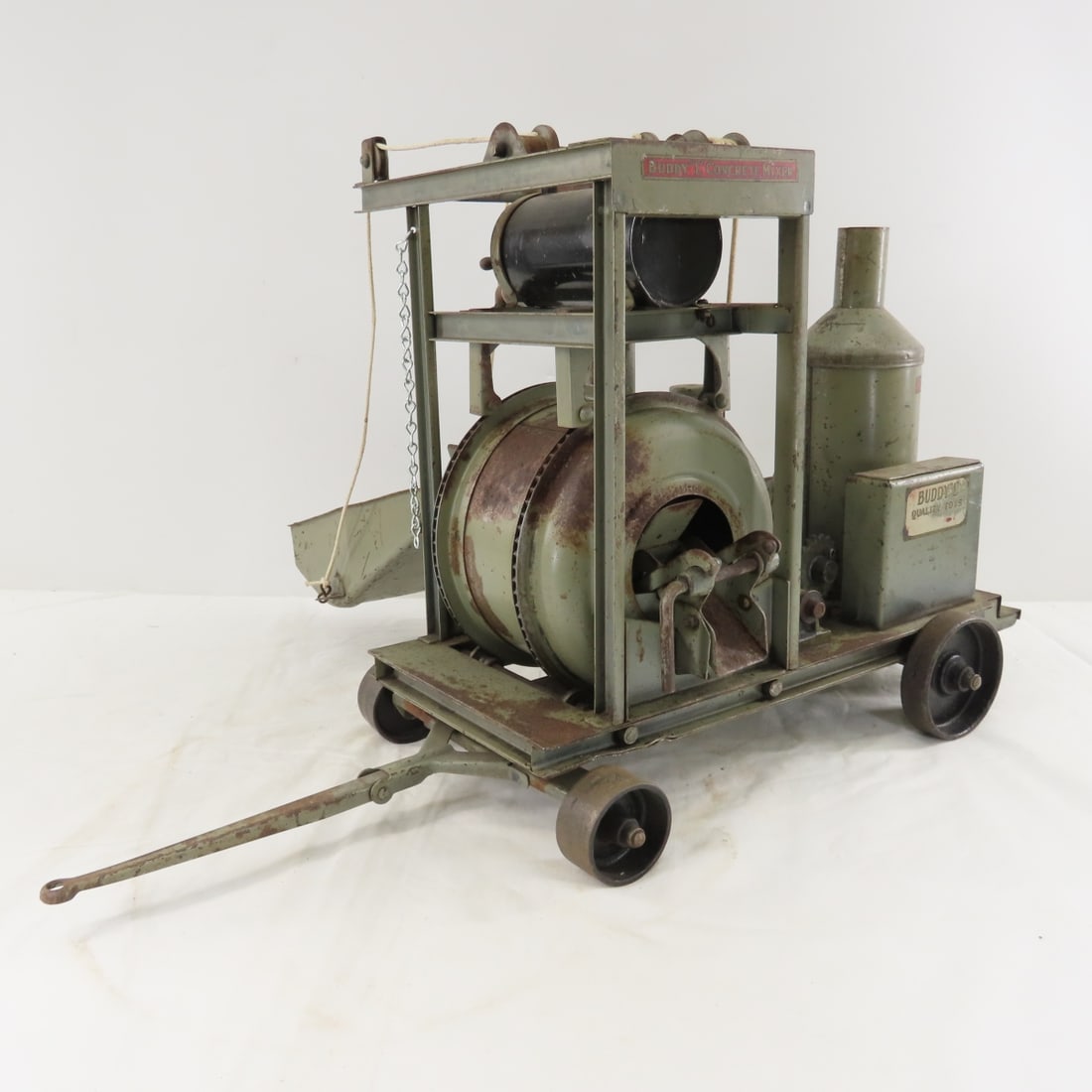 1920s Original Buddy L Concrete Mixer: 1920s Original Buddy L Concrete Mixer - LOT SIZE: 17x15x15" 17 LBS All information and photos, which are part of the description, are intended to be as accurate as possible, but errors are possible.