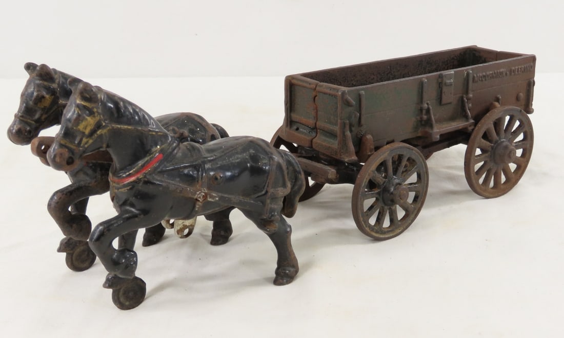 Arcade Cast Iron McCormick Deering 2 Horse Wagon: Arcade Cast Iron McCormick Deering 2 Horse Wagon - LOT SIZE: 11x3x5" 4 LBS All information and photos, which are part of the description, are intended to be as accurate as possible, but errors are pos