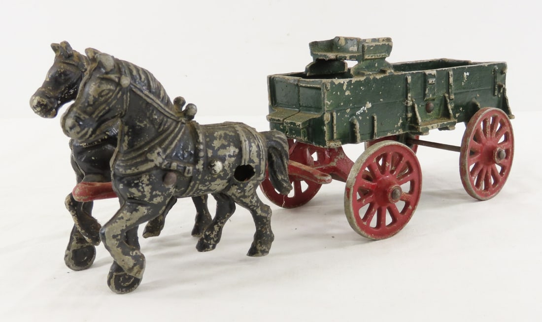 Vintage Stanley Cast Metal 2 Horse Drawn Wagon: Vintage Stanley Cast Metal 2 Horse Drawn Wagon - marked made in USA and 408 on tongue, heavy wear on paint. LOT SIZE: 12x5x4" 2 LBS All information and photos, which are part of the description, are