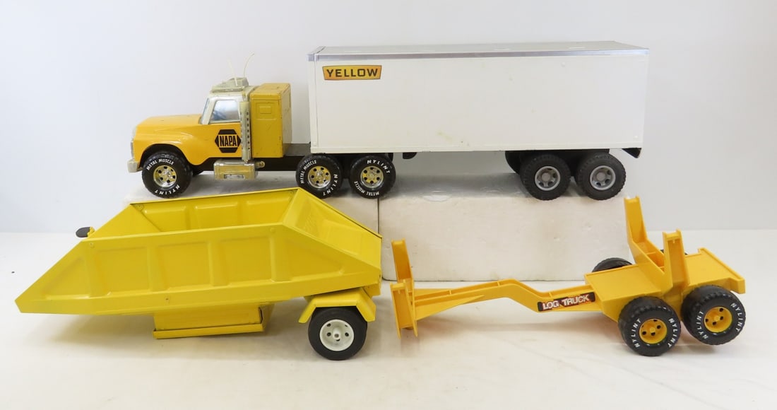 Nylint Semi Truck, Bottom Dump & Log Hauler: Nylint Semi Truck, Bottom Dump & Log Hauler - Original NAPA truck, repainted YELLOW trailer, Repainted bottom dump trailer, and plastic log hauler, approx 1/18 scale. LOT SIZE: 21x13x14" 13 LBS All