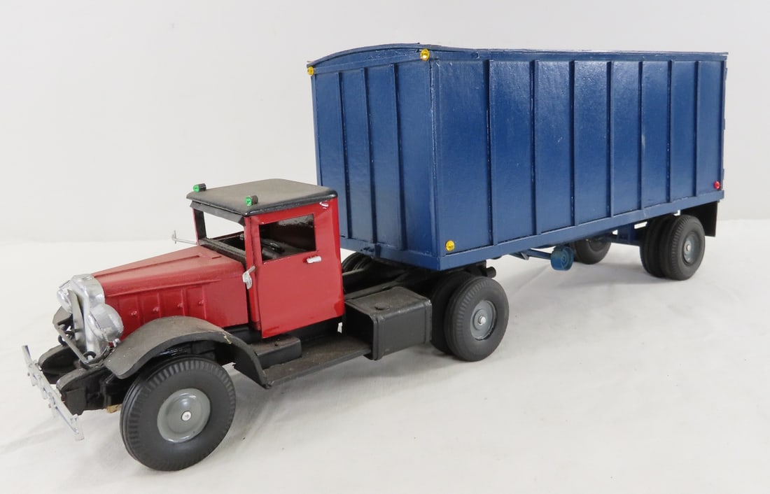 Custom Wood Model Tractor & Trailer: Custom Wood Model Tractor & Trailer - very fragile, doors do not open, unmarked, approx 1/24 scale. One small piece is broken off - in baggie. LOT SIZE: 17x4x7" 2 LBS All information and photos, which