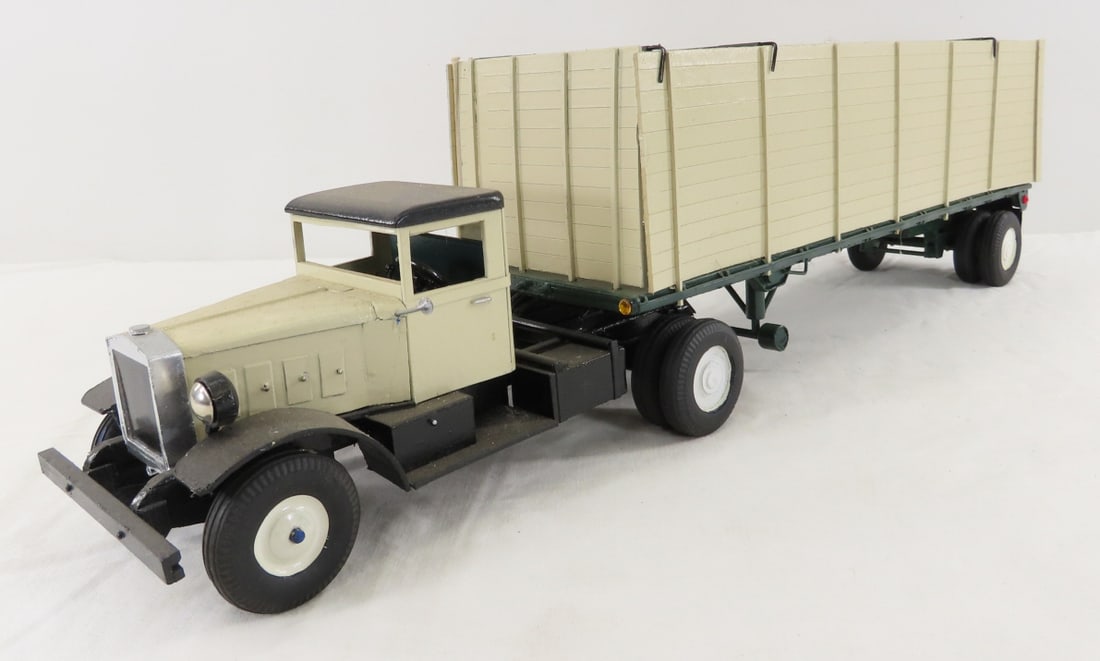 Custom Wood Model Farm Grain Truck: Custom Wood Model Farm Grain Truck - very fragile- balsa wood sides of trailer are loose from base, doors do not open, unmarked. Approx 1/24 scale LOT SIZE: 20x5x5" 2 LBS All information and photos,