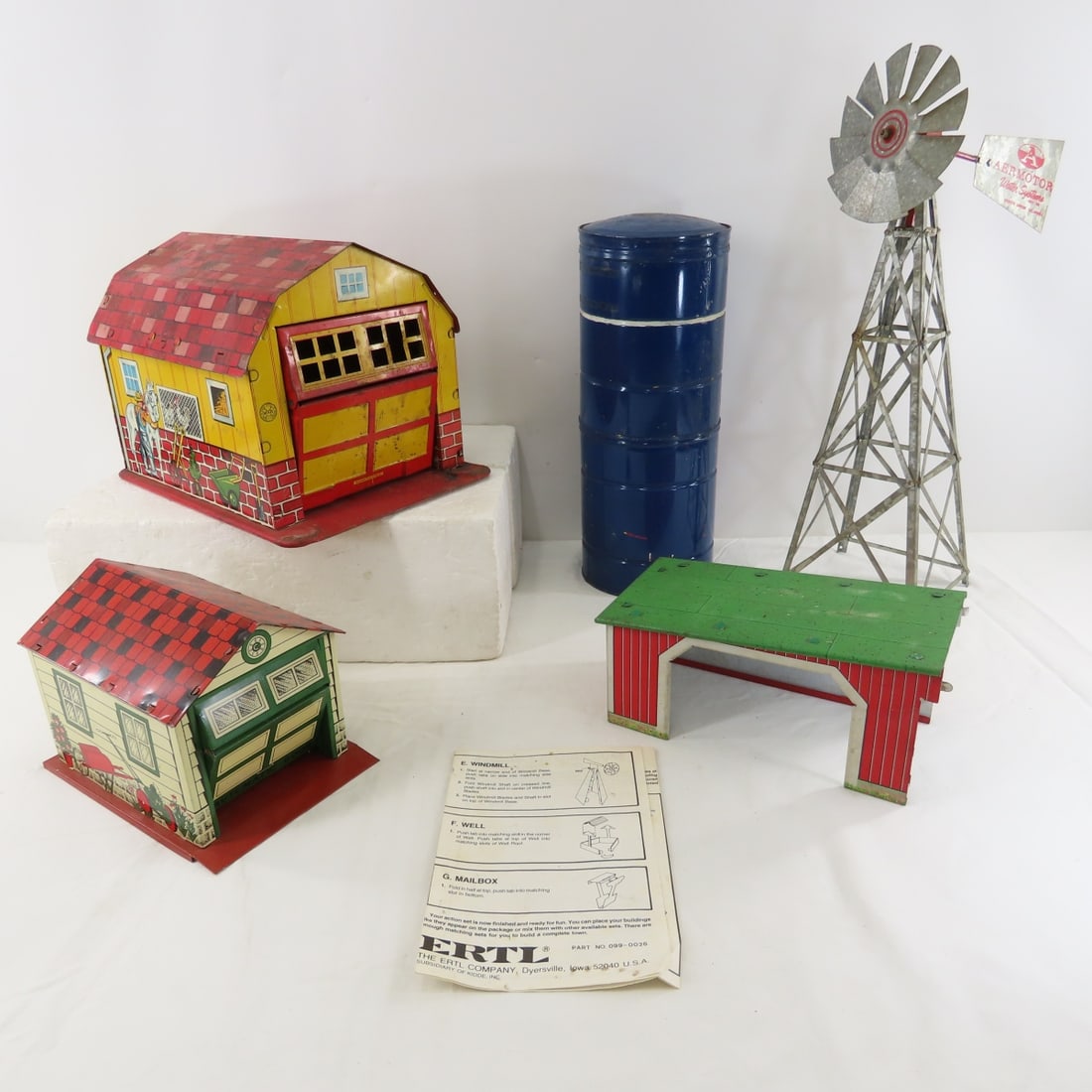 Aeromotor Salesman Sample Windmill & Farm Toys: Aeromotor Salesman Sample Windmill & Farm Toys - Aeromotor Water Systems sample metal windmill, Marx metal garage with fold open door,. SSS Japan metal shed, red & green metal side shed, and blue