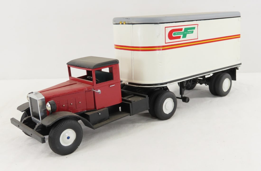 Custom Wood Consolidated Freight Tractor & Trailer: Custom Wood Consolidated Freight Tractor & Trailer - very fragile, doors do not open, unmarked, approx 1/24 scale. LOT SIZE: 15x5x6" 2 LBS All information and photos, which are part of the