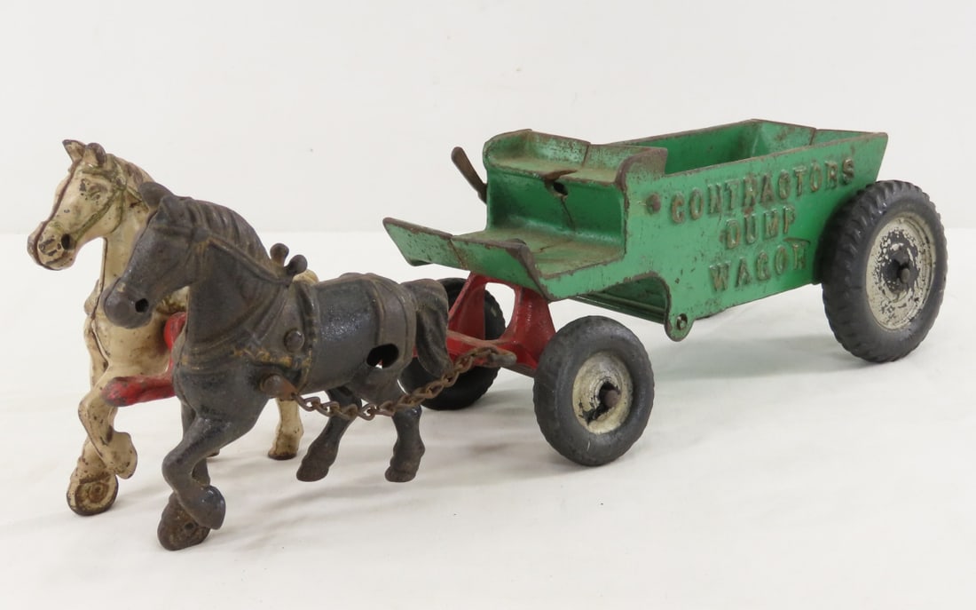 Arcade Cast Iron 2 Horse Contractors Dump Wagon: Arcade Cast Iron 2 Horse Contractors Dump Wagon - no driver, marked Arcade and made in USA on tongue, Auburn rubber balloon tires. LOT SIZE: 8x7x5" 4 LBS All information and photos, which are part of
