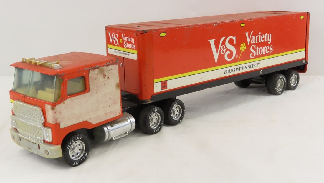 Vintage Nylint V&S Variety Stores Tractor Trailer: Vintage Nylint V&S Variety Stores Tractor Trailer - sticker missing on 1 side of tractor, broken horns, approx 1/43 diecast, LOT SIZE: 16x8x5" 3 LBS All information and photos, which are part of the