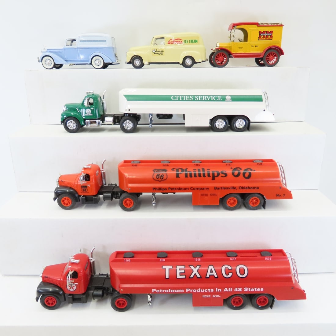 3 Plastic Truck & 3 Metal Car Banks, all have keys: 3 Plastic Truck & 3 Metal Car Banks, all have keys - Texaco & Phillips are Unique collectibles- battery op- Untested, Cities Services is by HGKII, Schwann's ERTL, blue car is Liberty Classics, ERTL